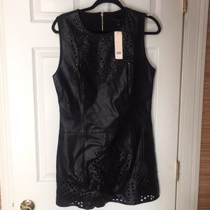 English Rose 95% Nylon and 5% spandex dress.